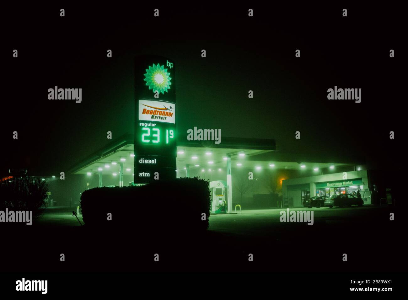 BP gas station at night with fog. BP is a petroleum company with its