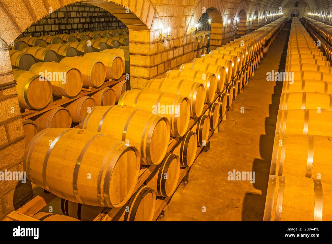 Wine Barrels Stacked In The Cellar Of The Winery Stock Photo Alamy