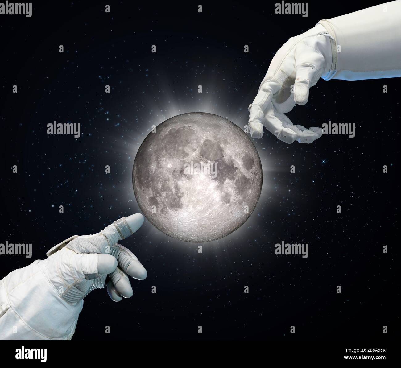 Astronaut and robotic hand in contact. Elements of this image furnished by NASA. Stock Photo