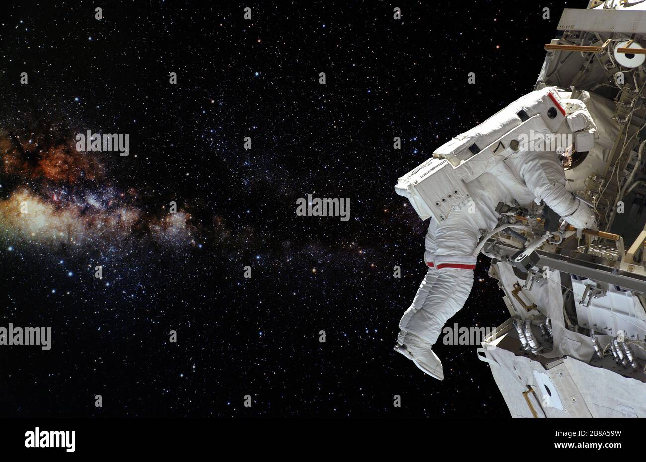 Astronaut on space mission with earth on the background. Elements of this image furnished by NASA. Stock Photo