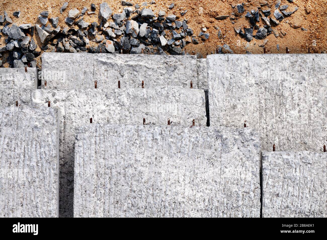 Concrete slabs pile, Texture concrete background, Concrete for construction work on the sand and stones Stock Photo