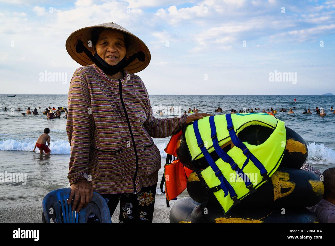 Portrait of a woman on An Bang Beach, Hoi An, Vietnam Stock Photo