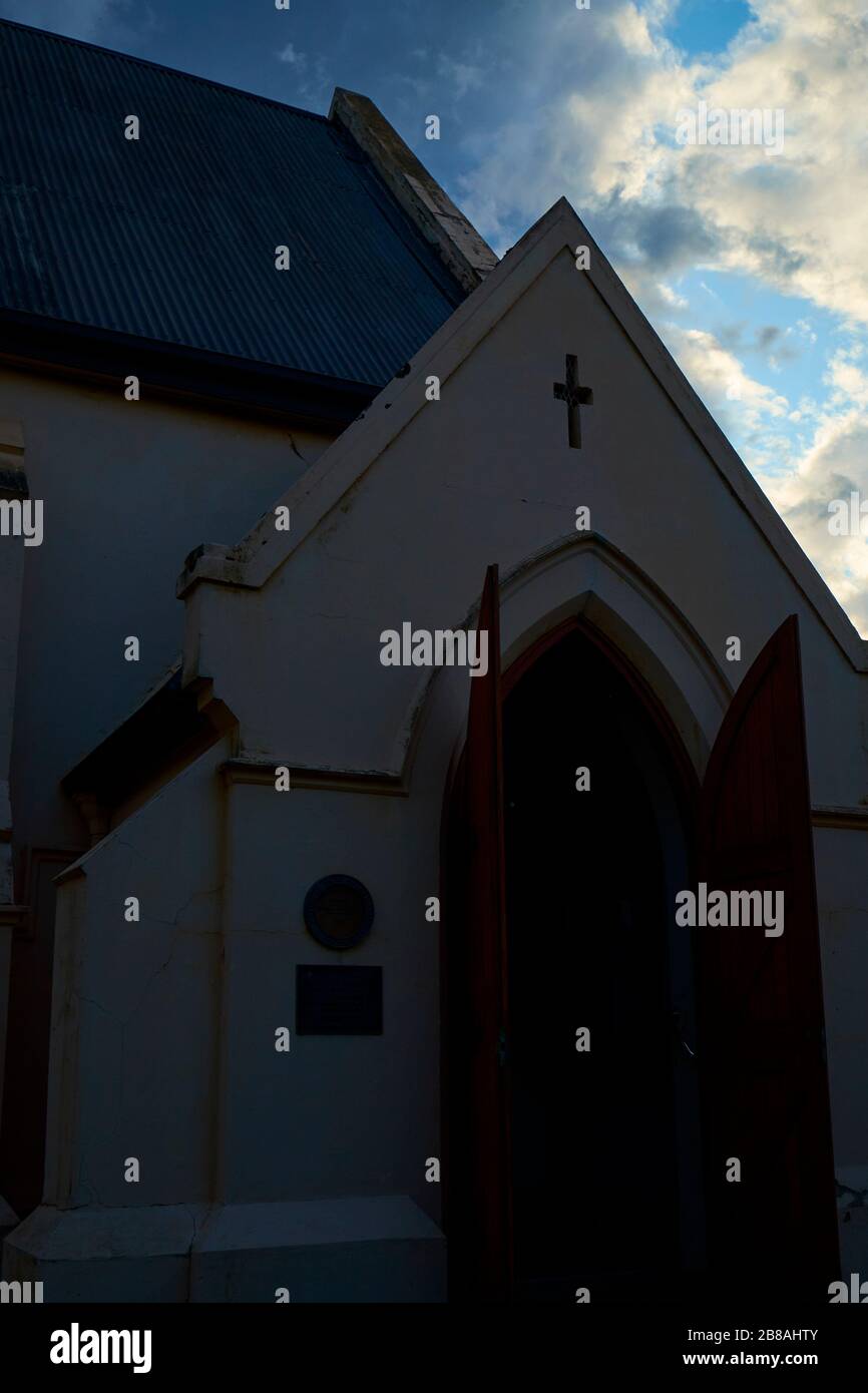 A moody look of the clouds at sunst behind St Luke's church. In Yea, Victoria, Australia. Stock Photo