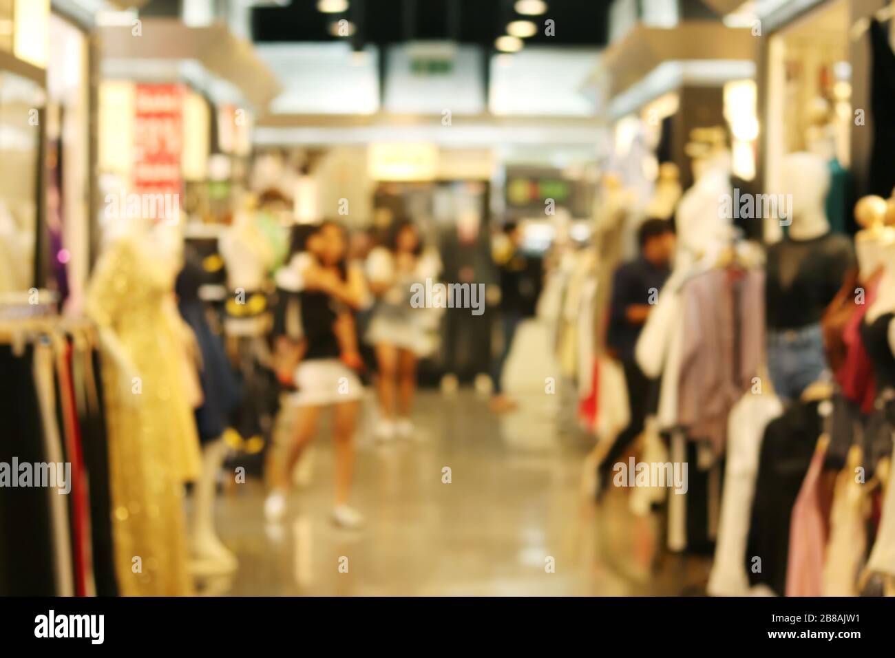 Blurred picture background of inside shopping mall clothing store ...
