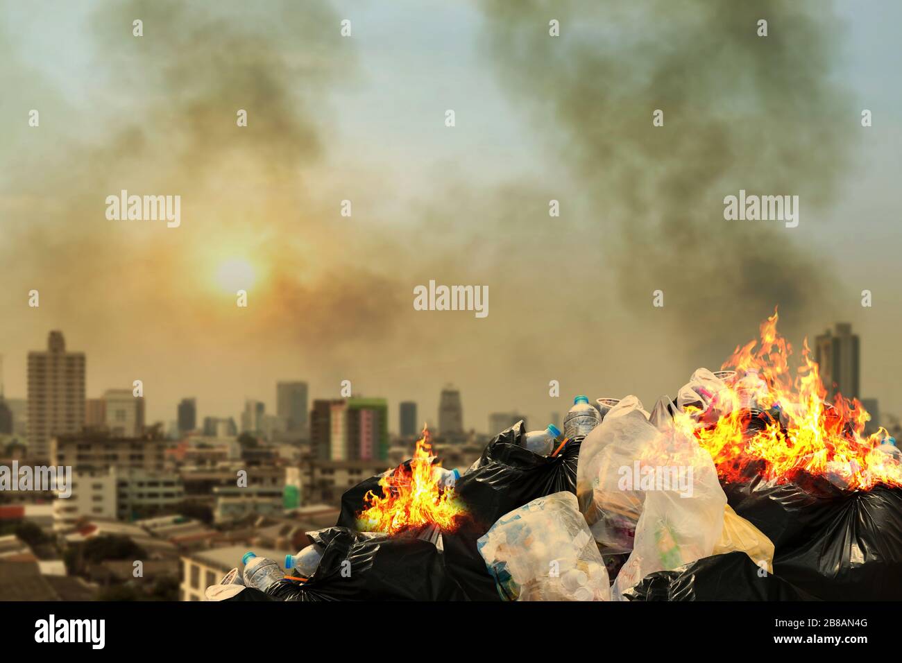 https://c8.alamy.com/comp/2B8AN4G/burn-lot-waste-front-city-community-garbage-bin-pile-dump-lots-of-junk-polluting-burning-heap-smoke-from-burning-pile-garbage-pollution-damage-dust-2B8AN4G.jpg