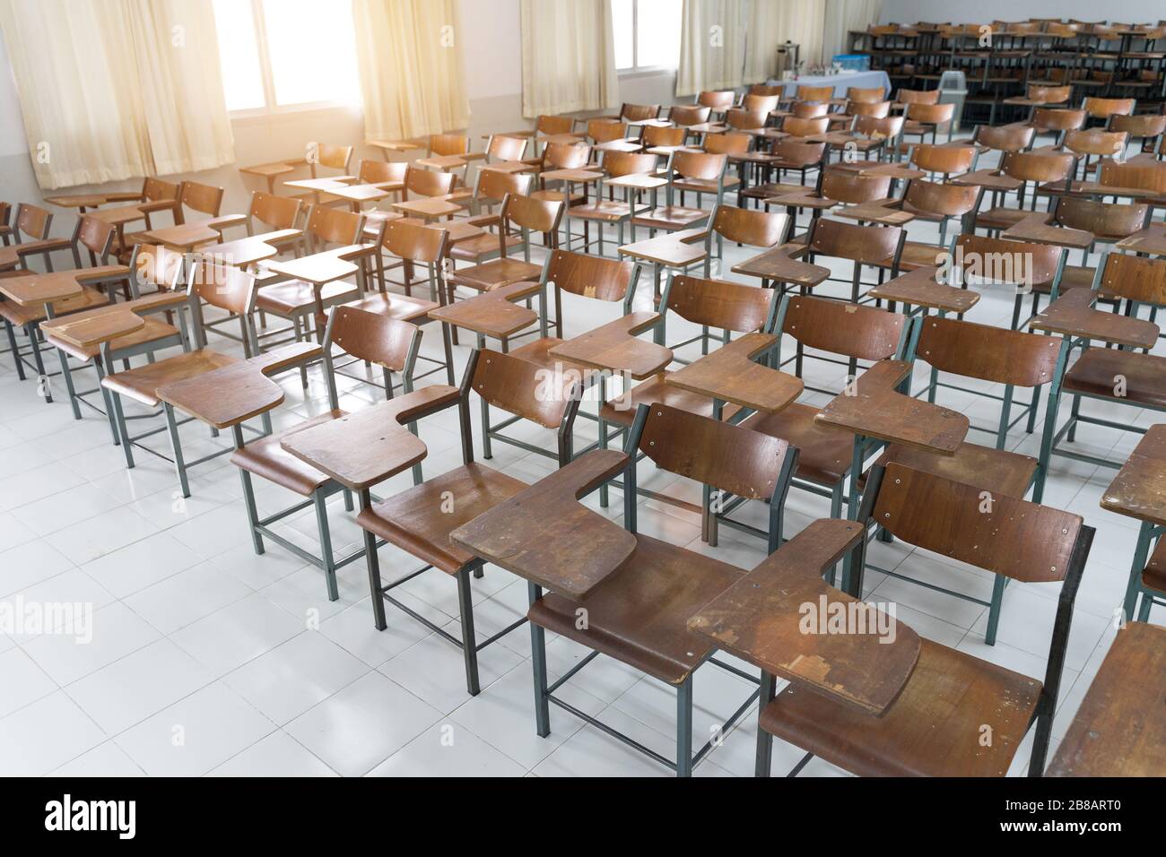 Empty classroom with a lot of chairs with no student. Empty