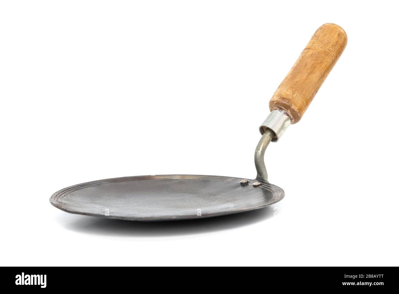 Indian iron tawa or pan to prepare chapati, roti on white background Stock Photo