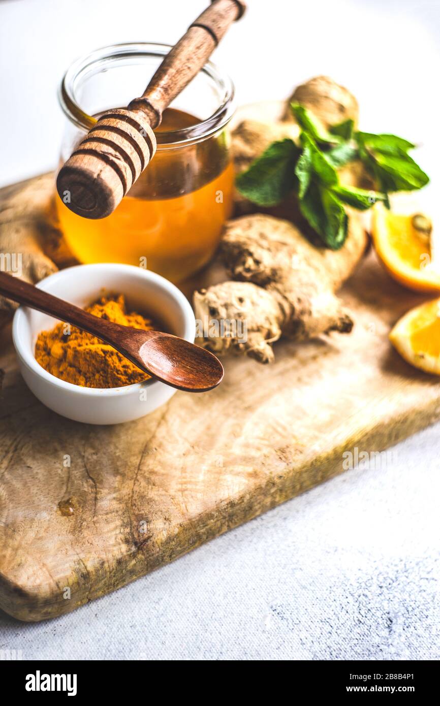 Ingredients for energy drink helping stay healthy with ginger, lemon