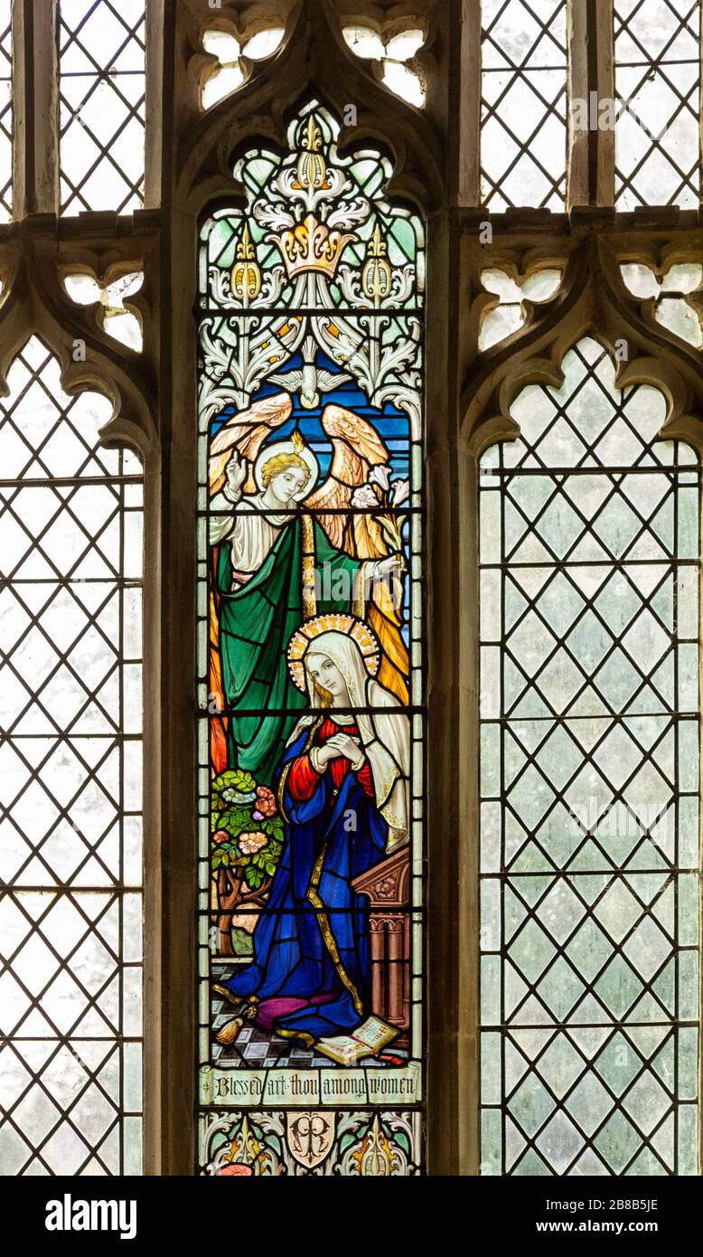 Stained glass window depicting Annunciation, 'Blessed are the pure in