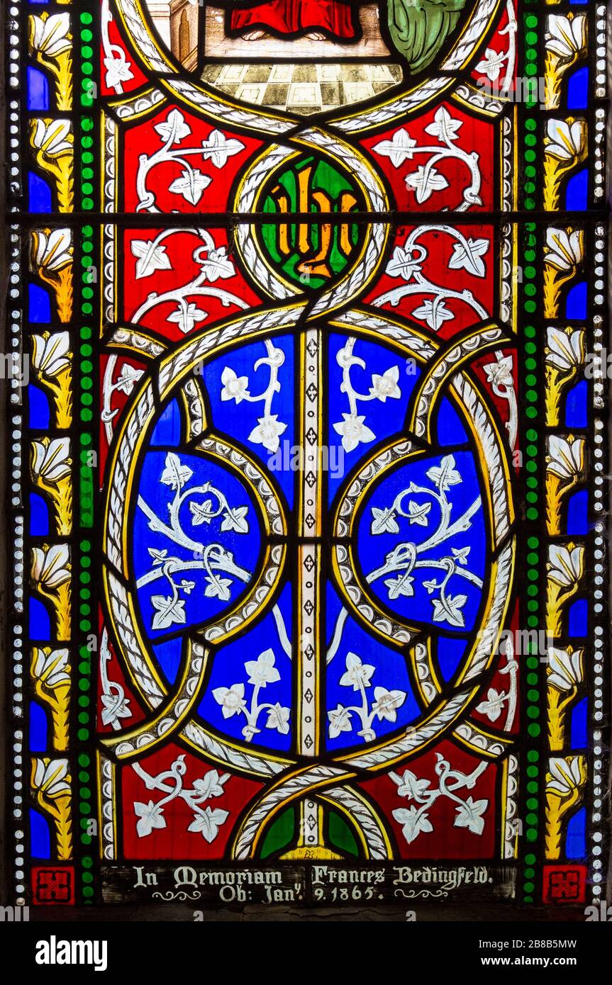 Stained glass window Caritas or Charity, Bedingfield church, Suffolk