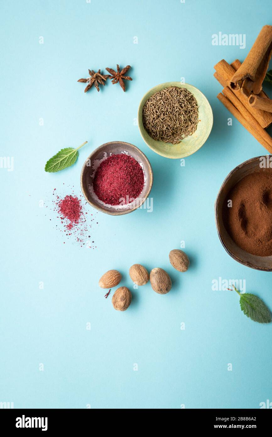 Powder sumac, nutmeg and other spices Stock Photo Alamy