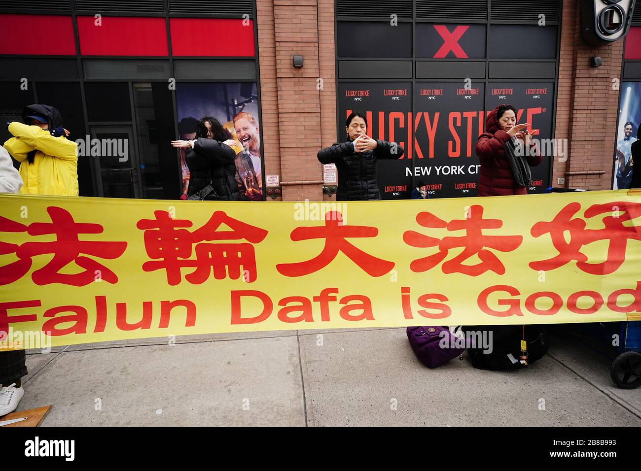 New York, USA. 20th Mar, 2020. Chine religious Falun Gong practitioner protest outside the Chinese Consluate building, Friday, March 20, 2020, in New York in the wake of the coronavirus COVID-19 pandemic. Credit: European Sports Photographic Agency/Alamy Live News Stock Photo