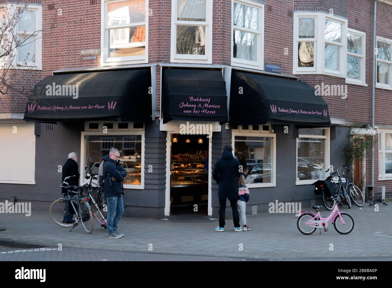 Standing In Line At The Bakery Because The Shop Is To Small At Amsterdam The Netherlands 2020 Stock Photo
