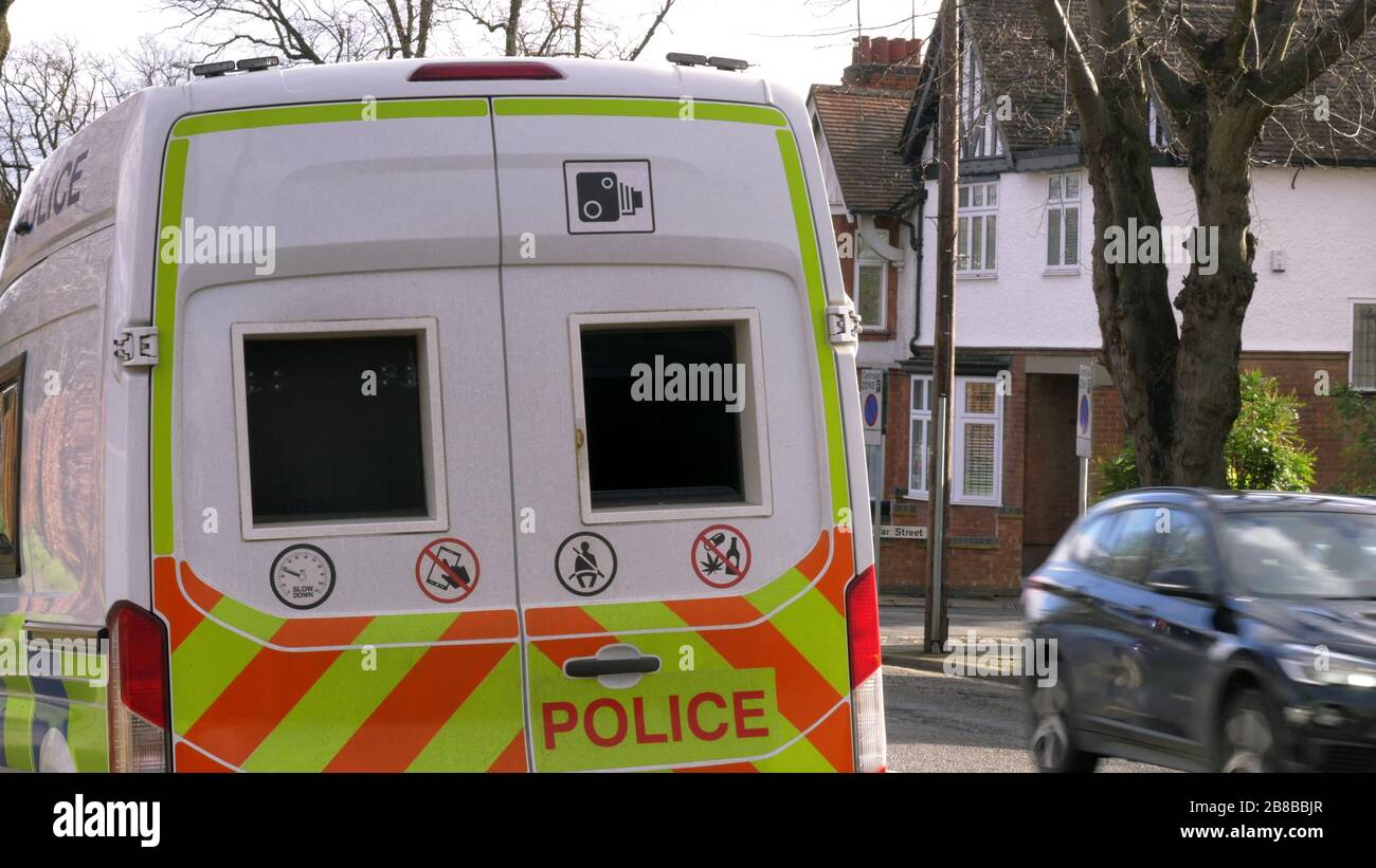 anpr camera van on british town road with traffic passing in england uk