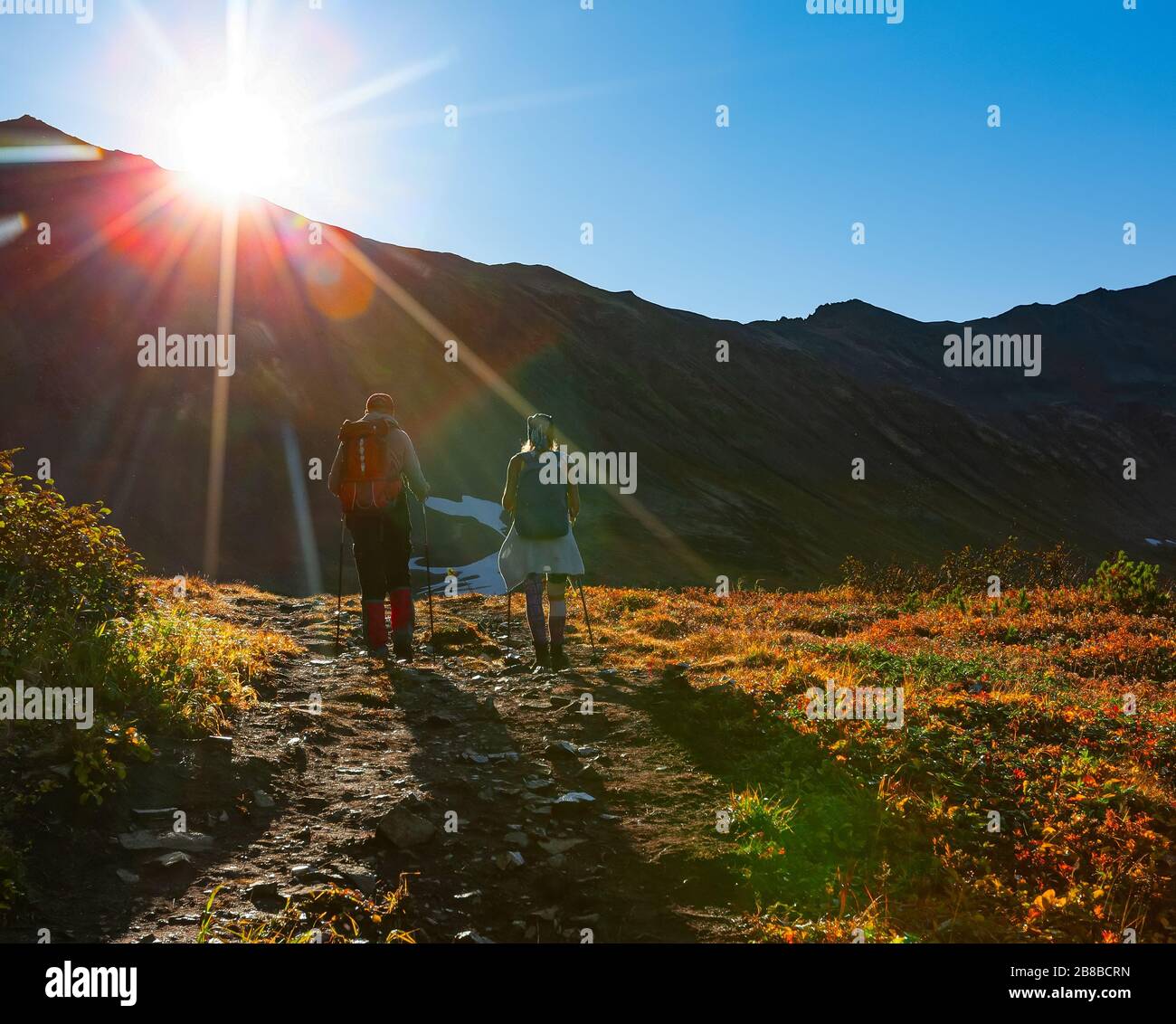 Couple hikers climbing steep trail hi-res stock photography and images ...