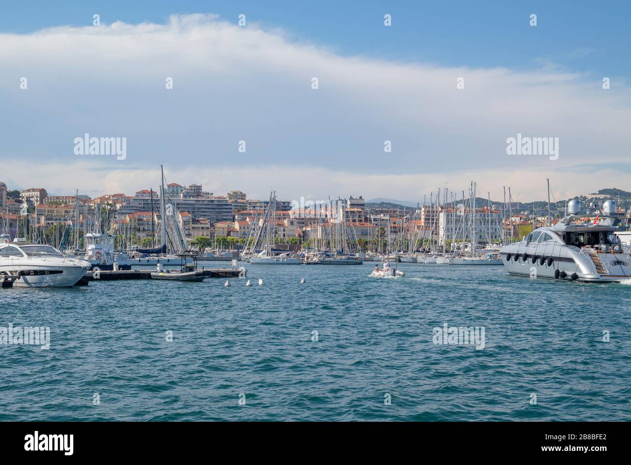Cannes, France - 21.06.2019: Beautiful view on the town and marina. Cannes harbour view. Luxury yachts in the port. Travel locations in France Stock Photo