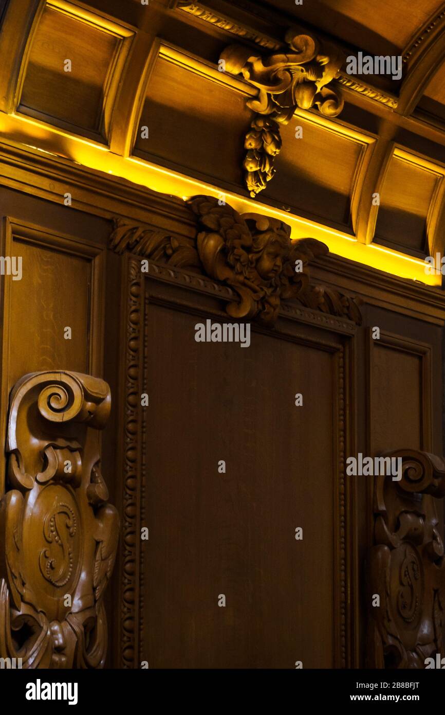Majestic wood doors inside the Saint Paul Church in Paris Stock Photo