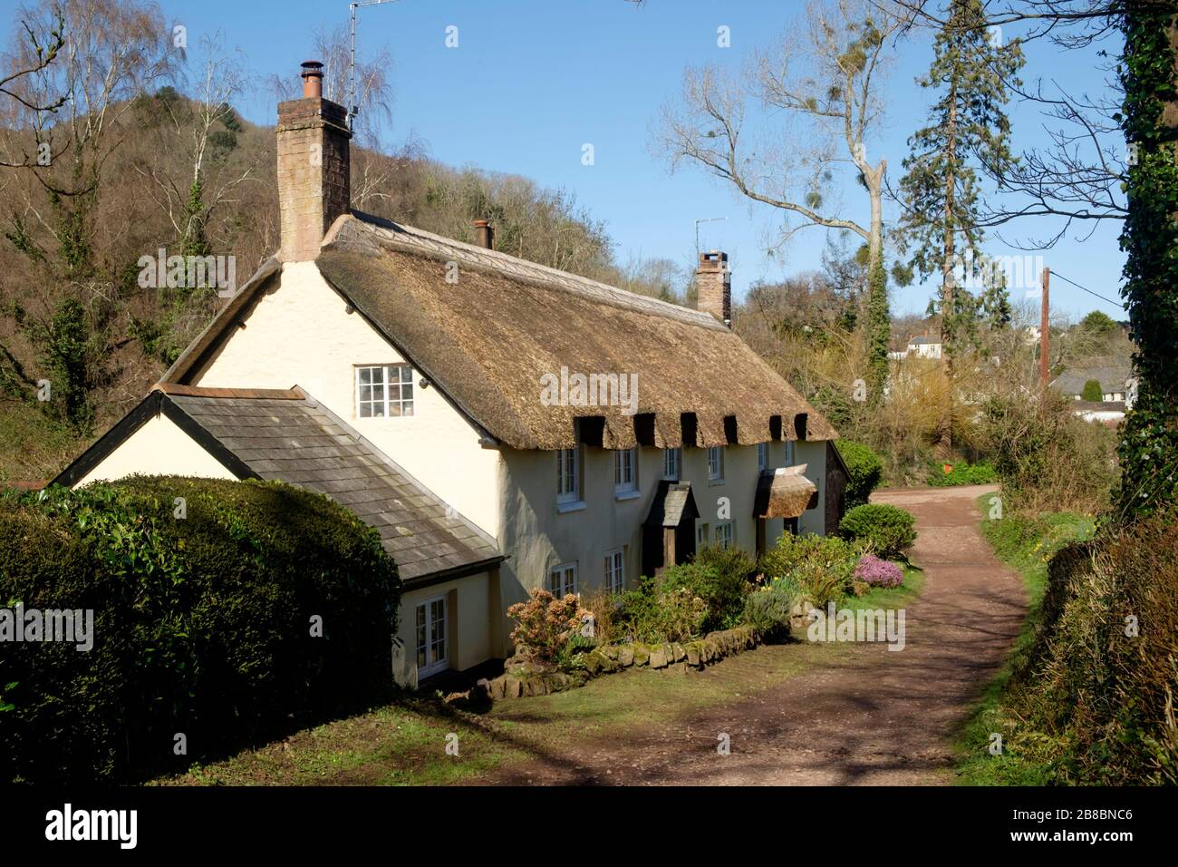 Dunster a small picturesque village on Exmoor in north somerset UK. Traditional Thatched cottage