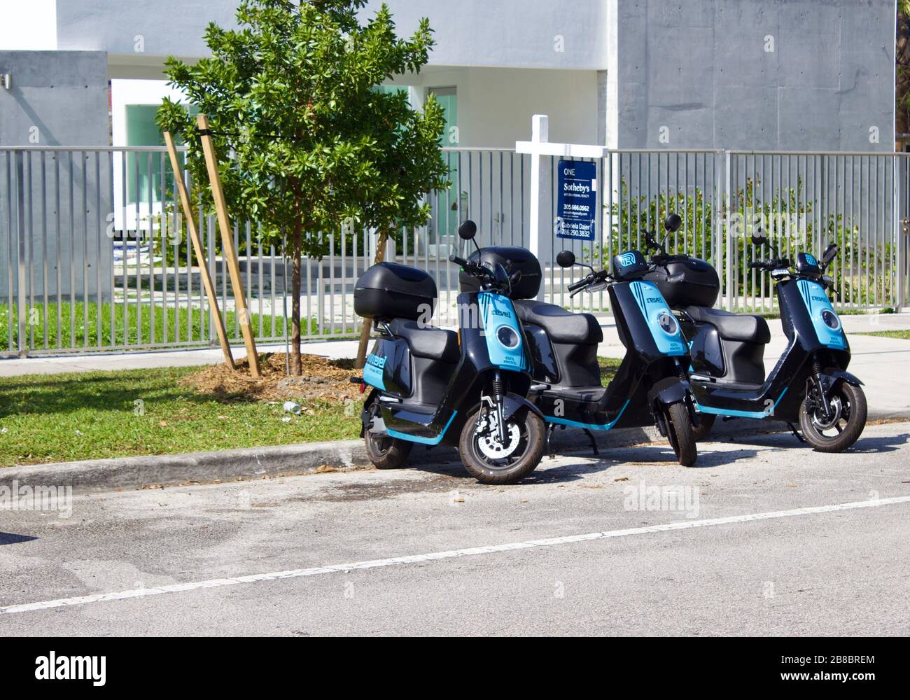 3/5/2020 Miami FL Multiple Revel electric mopeds on a street in a