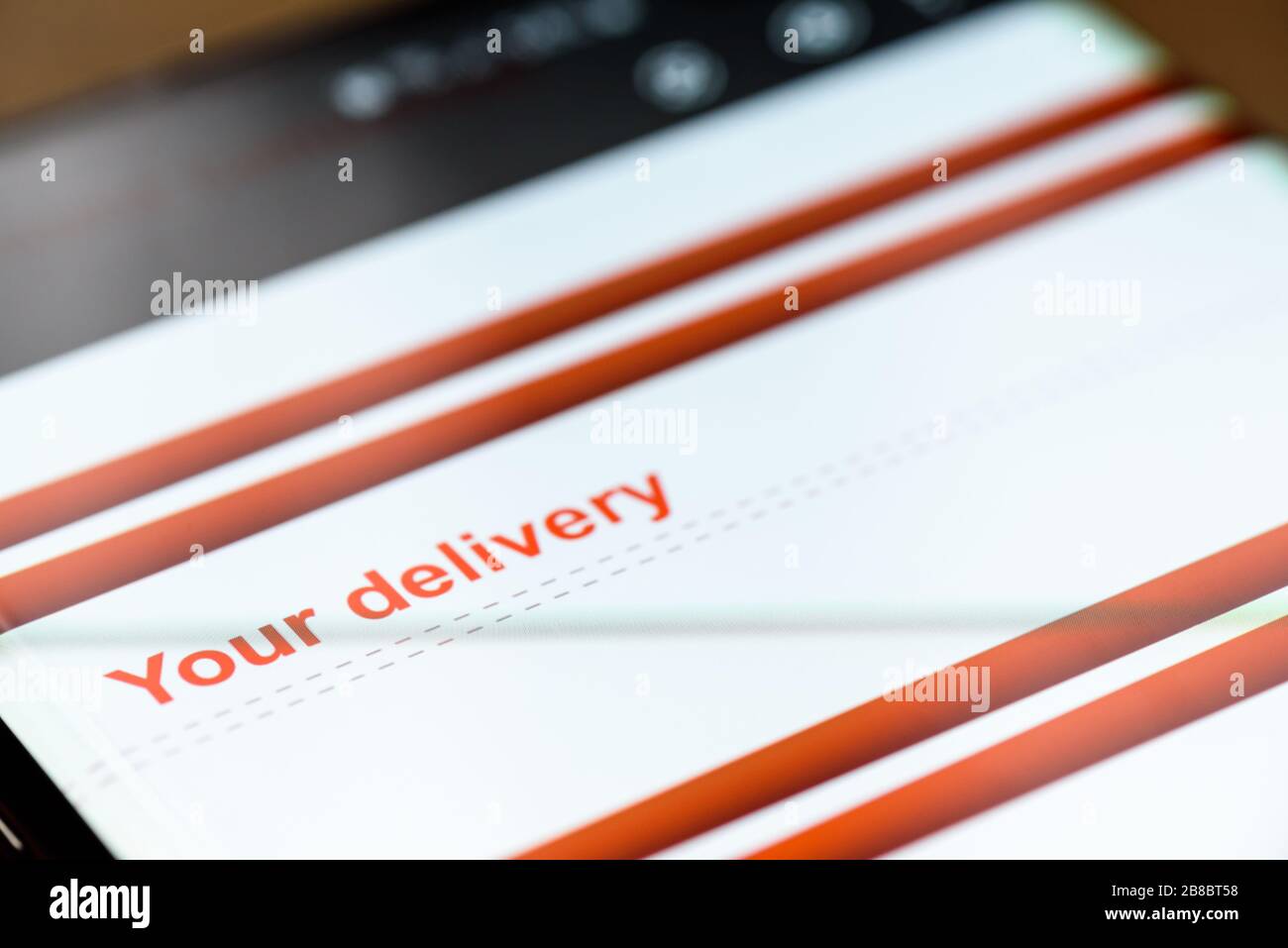 your delivery text on smart phone screen. Stock Photo