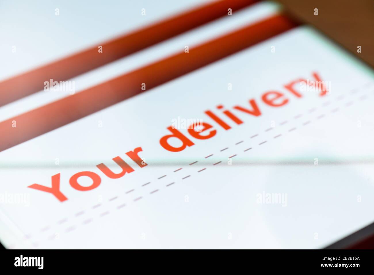 your delivery text on smart phone screen Stock Photo - Alamy