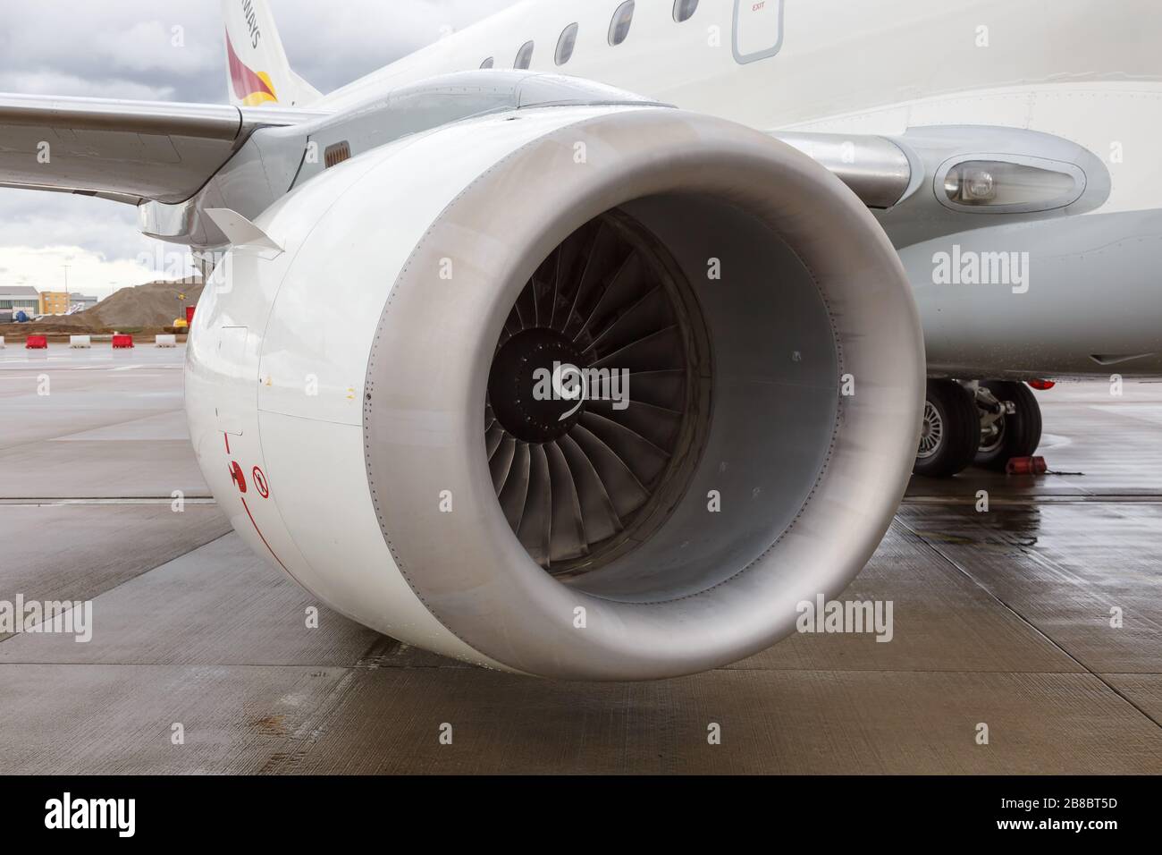 Cologne, Germany – November 2, 2019: Engine of a German Airways Embraer 190 airplane at Cologne Bonn airport (CGN) in Germany. Stock Photo