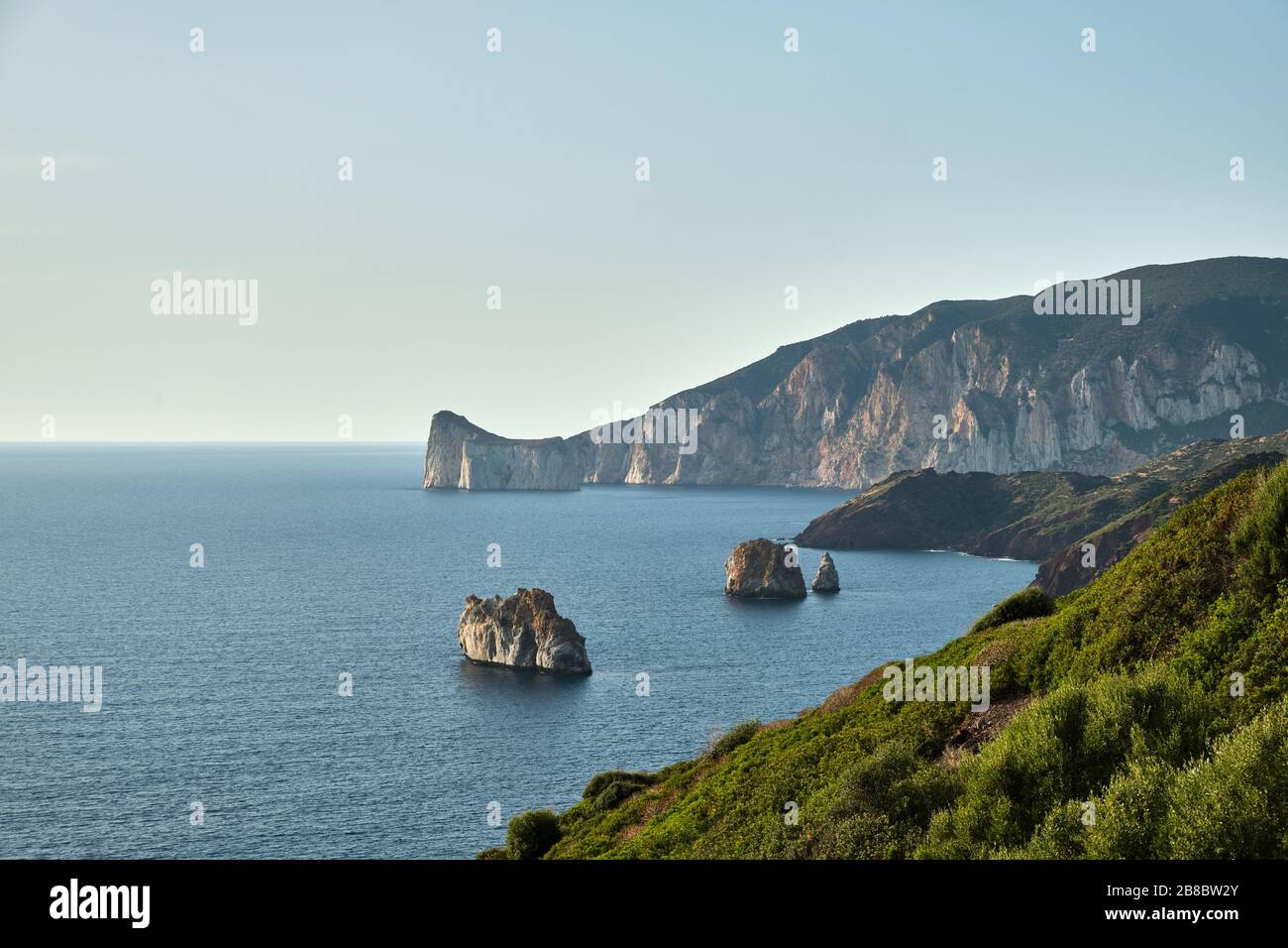 Pan di Zucchero faraglione, a big rock near Masua, Sardinia, Italy Stock Photo