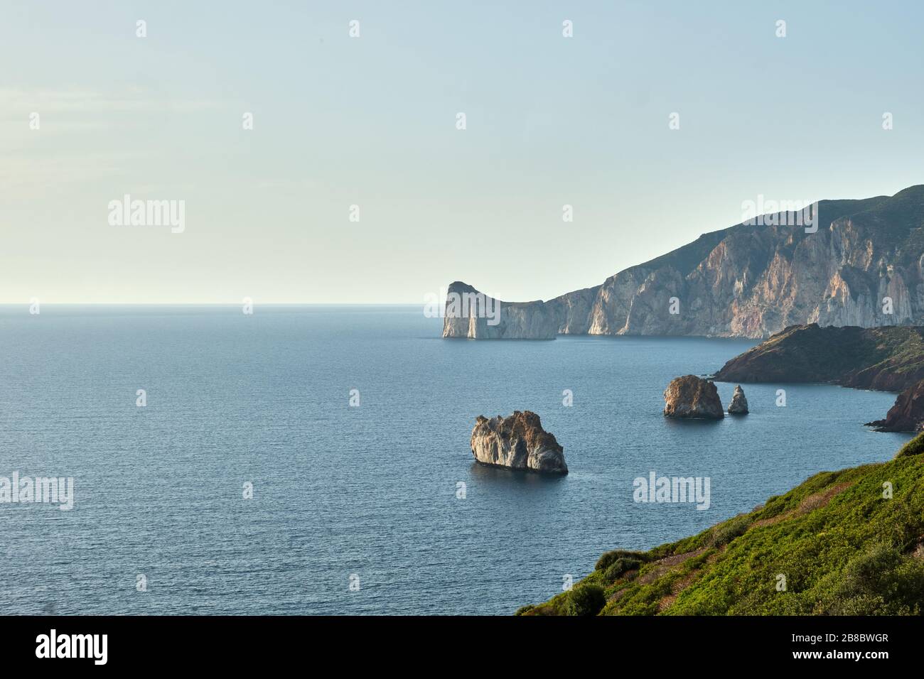 Pan di Zucchero faraglione, a big rock near Masua, Sardinia, Italy Stock Photo