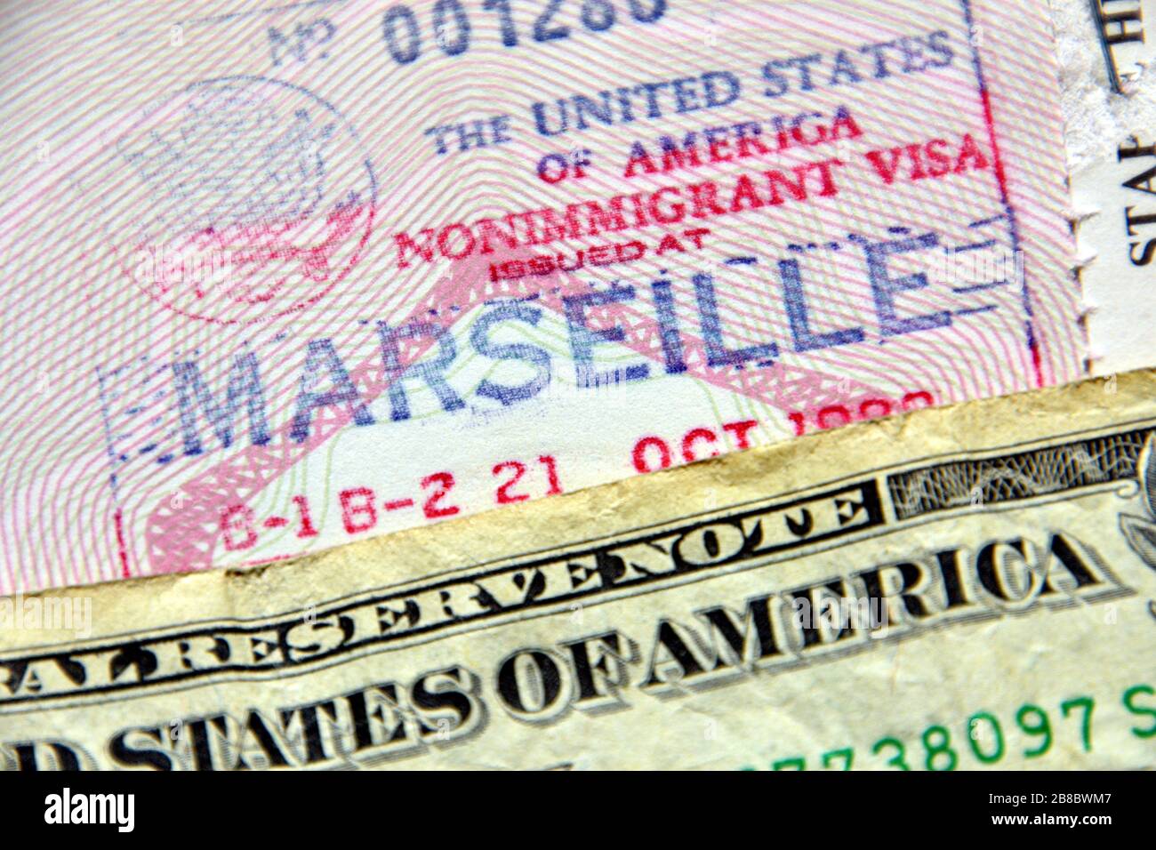 In this photo illustration an american visa stamped on a French passport.US  authorities are suspending the issuance of visas in several countries  around the world due to the pandemic of Coronavirus Stock