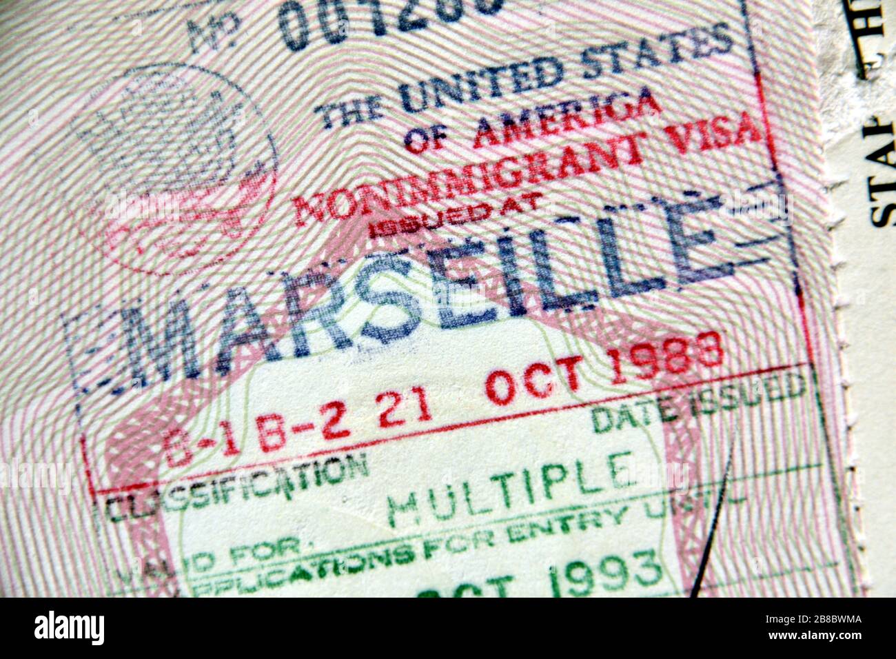 In this photo illustration an american visa stamped on a French passport.US  authorities are suspending the issuance of visas in several countries  around the world due to the pandemic of Coronavirus Stock