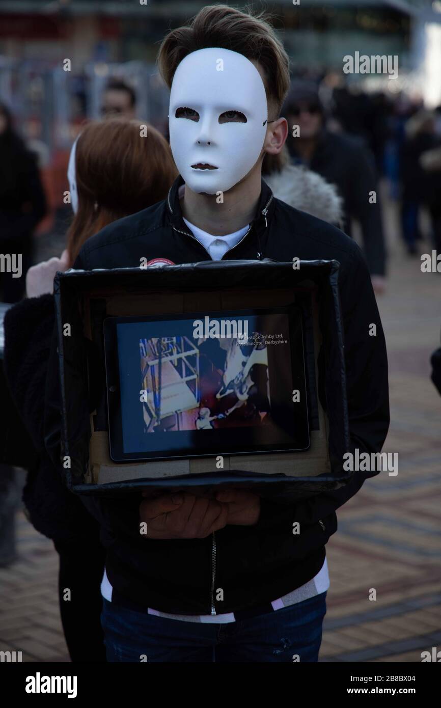 Vegan Protest masked individual Stock Photo - Alamy