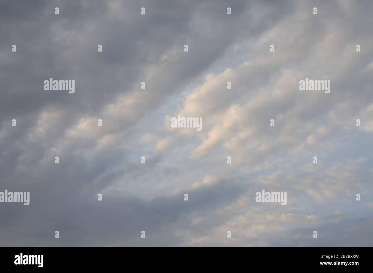 Blue sky with fluffy clouds for background Stock Photo - Alamy