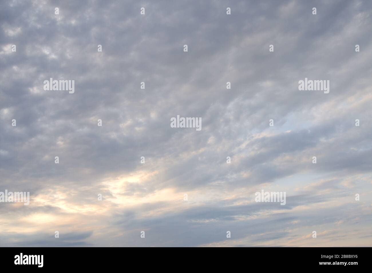 Blue sky with fluffy clouds for background Stock Photo - Alamy