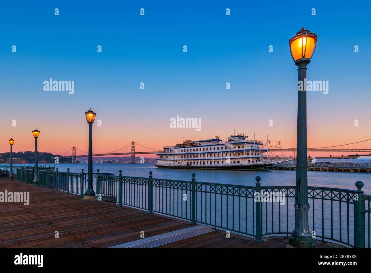 San Francisco Belle boat moored at dock. The paddlewheel style vessel