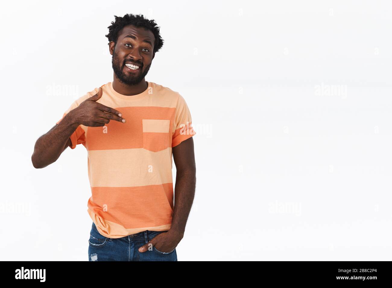 Confident, sassy young handsome african-american beared guy pointing himself with pleased, proud smile, telling about himself, bragging or boastfully Stock Photo