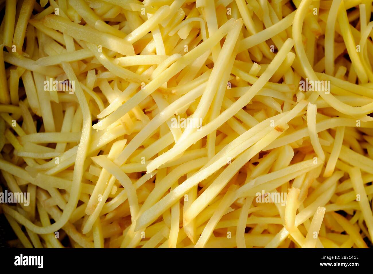 sliced fresh ginger roots background Stock Photo