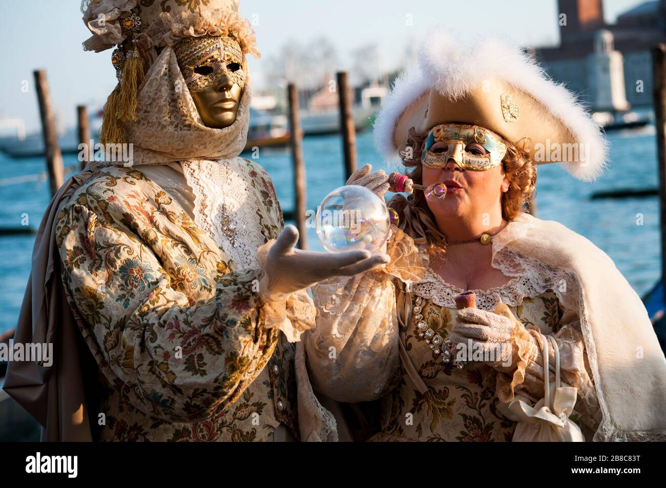 Venice Carnival Characters In A Colorful Brown And Gold Carnival 