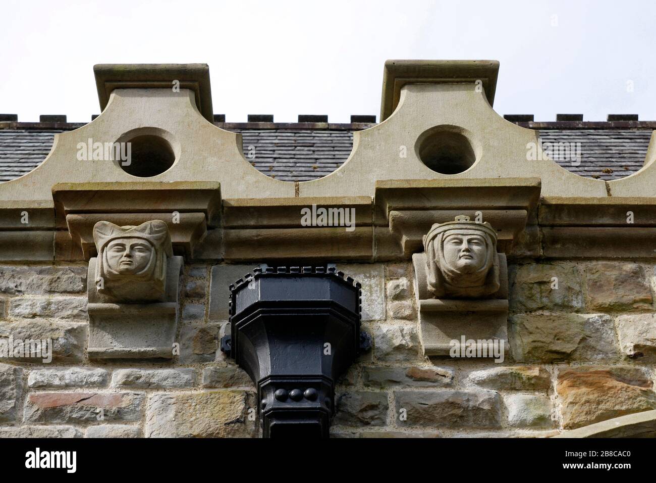 Clyne Chapel carved stone heads, Mumbles, Swansea, Wales, UK Stock Photo