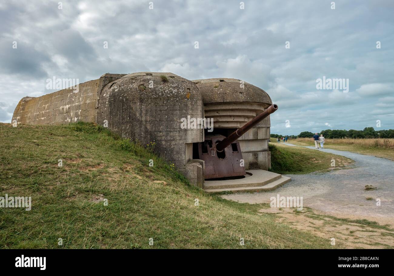 Tourists visiting the World War II gun battery of Longues-sur-Mer in Normandy. Stock Photo