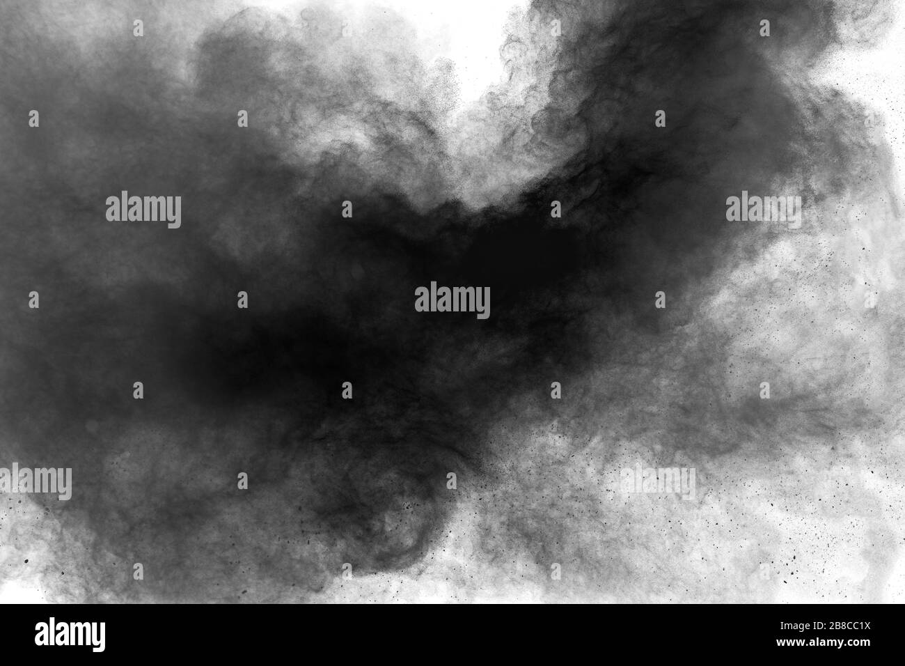 Black particles splatter on white background. Black powder dust burst. Stock Photo