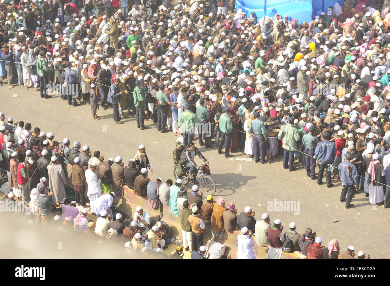 Devotees from home and abroad joined the 'Akheri Monajat 'of Biswa Ijtema, a function of Tablig Jamaat on the Turag bank in Tongi to seek divine bless Stock Photo
