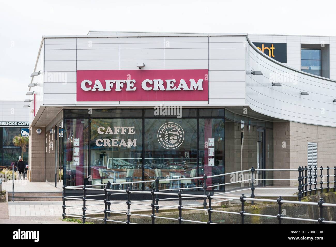 New Brighton, Wirral, UK. 12th March 2020. Using ‘takeaway’ as a loophole to ignore government instructions to close, Starbucks franchise stores owned by EuroGarages, and the other high street chain Costa Coffee, remain open to customers to go into the cafe area to order drinks to take out.  Although Starbucks have declared all UK stores will close, franchisees are not following.  Most other businesses in the area have followed government instructions and are closed.  The general public also don’t appear to be following government advice.  Credit: Paul Warburton/Alamy Live News Stock Photo