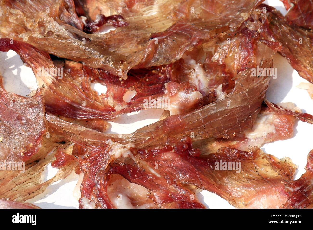 sun-dried pork, sheet pork dried by sun, process of sheet pork or crispy pork (thai food) Stock Photo