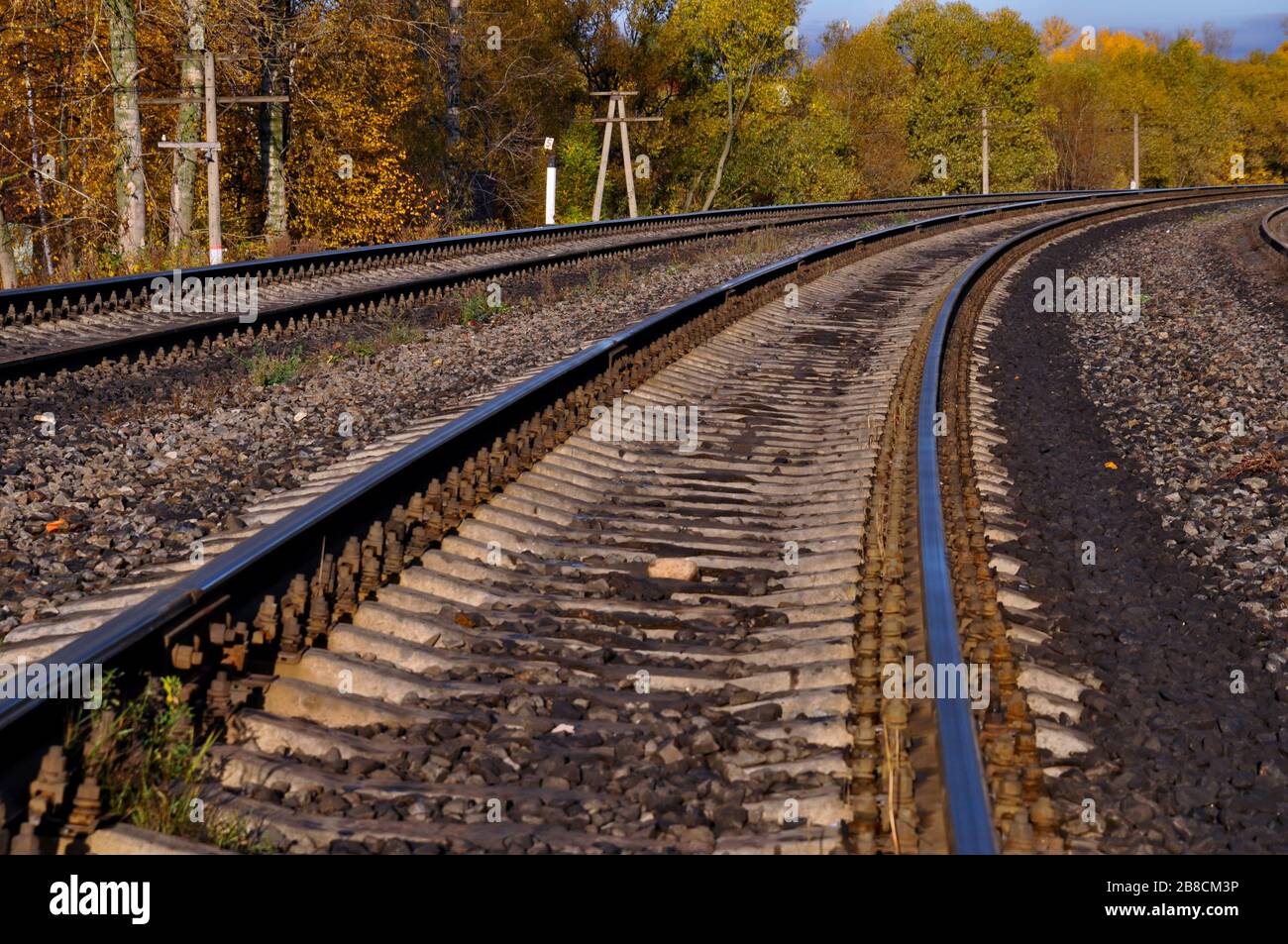 An autumn landscape with a railroad. Stock Photo