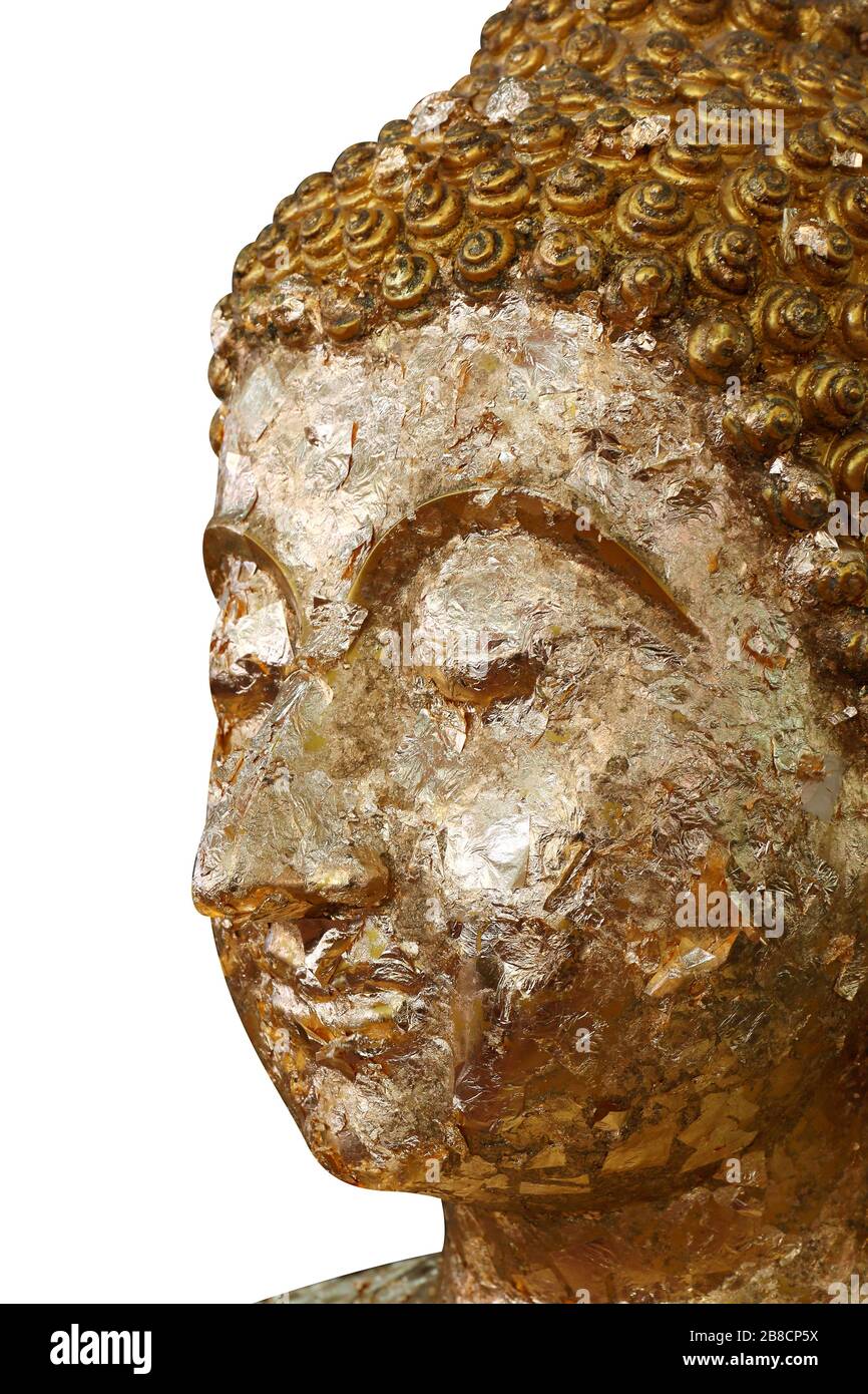buddha statue, golden buddha face statue close-up isolated on white background Stock Photo