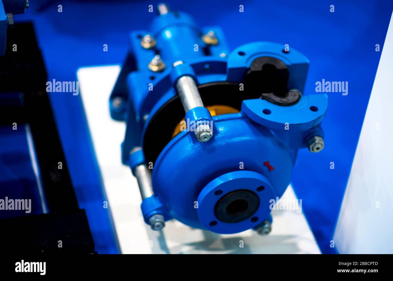 The valve with is presented in a section. Blue cast iron gate valve for a industrial piping wedge with rubber wedge. Throttle with gearbox. Manual val Stock Photo