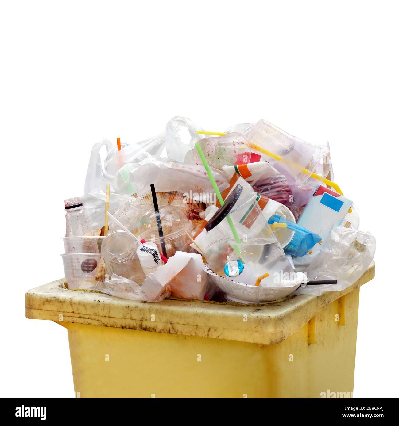 Waste heap, Waste Garbage trash plastic full of trash bin yellow, Plastic bag waste Lots of junk isolated on white background, Garbage many close-up Stock Photo