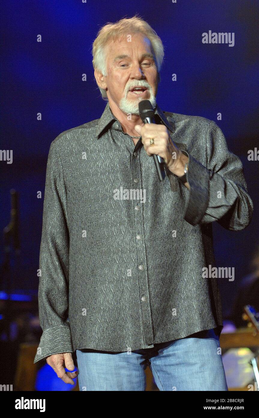 20 March 2020 - Kenny Rogers, whose legendary music career spanned nearly six decades, has died at the age of 81. Rogers was inducted to the Country Music Hall of Fame in 2013.' He had 24 No. 1 hits and through his career more than 50 million albums sold in the US alone. He was a six-time Country Music Awards winner and three-time Grammy Award winner. Some of his hits included 'Lady,' 'Lucille,' 'We've Got Tonight,' 'Islands In The Stream,' and 'Through the Years.' His 1978 song 'The Gambler' inspired multiple TV movies, with Rogers as the main character. File Photo: 12 July 2007- Myrtle Beach Stock Photo