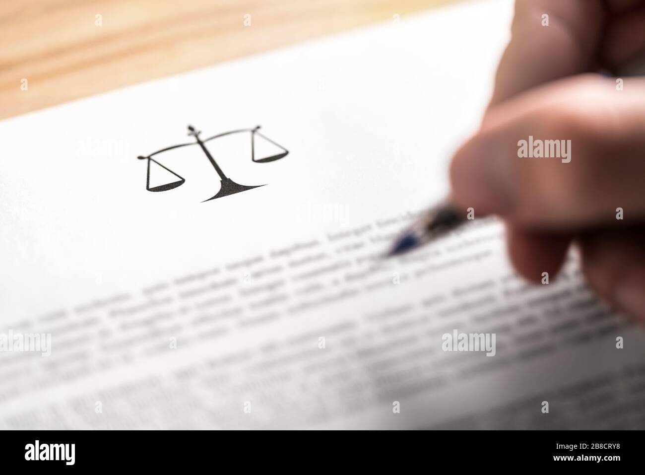 Attorney, lawyer, solicitor or jurist working on a business brief in law firm. Legal contract, clause or article paper. Stock Photo