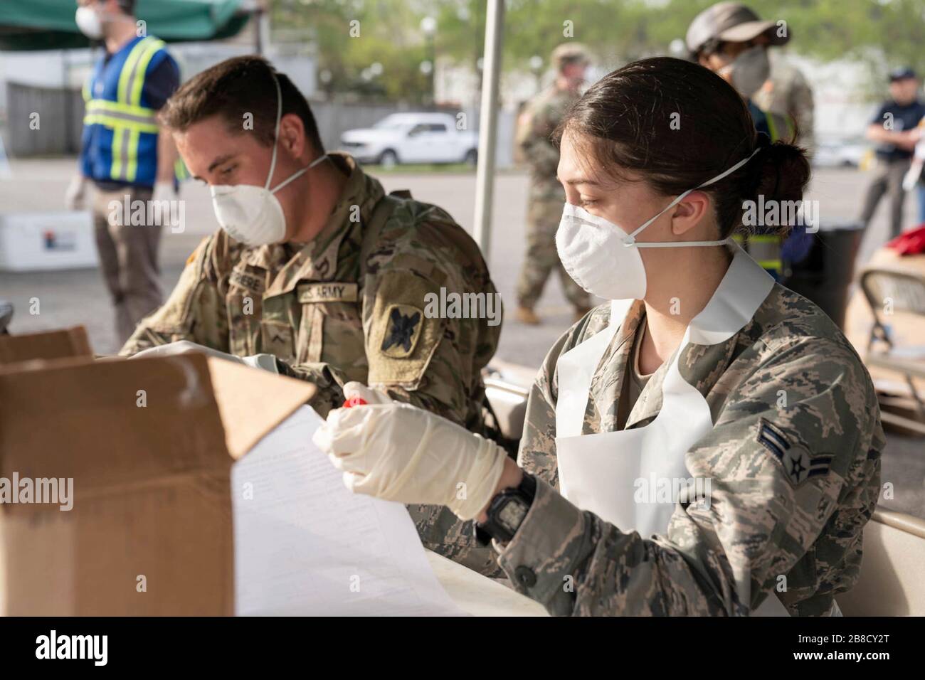 New Orleans, United States. 20th Mar, 2020. Louisiana National Guard members test first responders for the COVID-19, coronavirus at a Mobile Testing Center located at Louis Armstrong Park March 20, 2020 in New Orleans, Louisiana. The testing site is one of three across New Orleans and Jefferson Parishes and will soon open to the general public. Credit: Josiah Pugh/Planetpix/Alamy Live News Credit: Planetpix/Alamy Live News Stock Photo